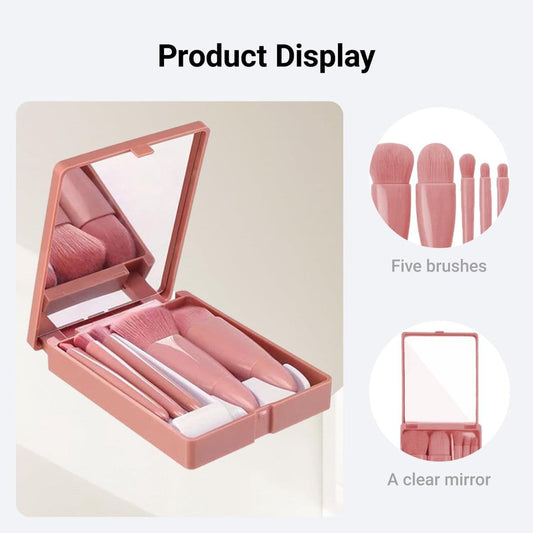 Pink makeup brush set with five brushes in a compact mirror case