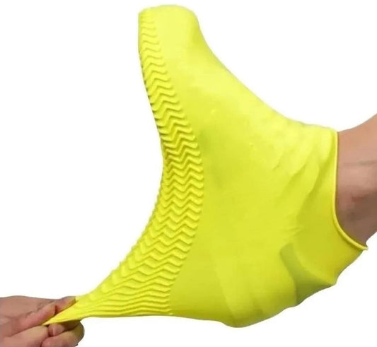 Yellow silicone overshoe with ridged tread sole and pull-on ankle opening