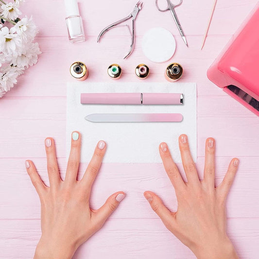 Pink glass nail file with matching file pieces and metal end caps