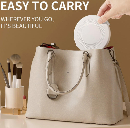 Round mini makeup mirror with light, white back, compact for travel