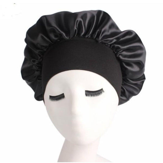 Black satin hair bonnet with ruffled edge, worn on head mannequin
