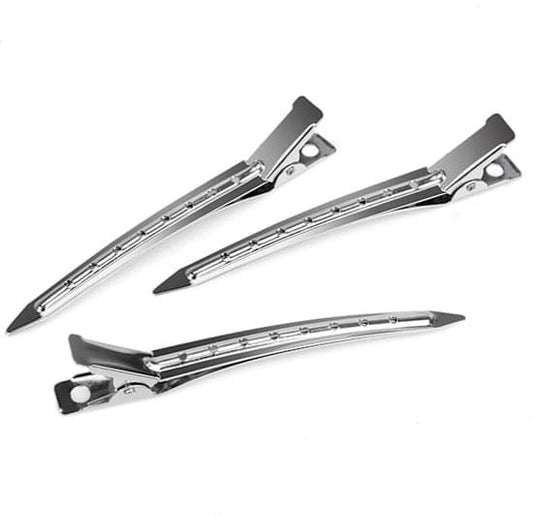 Duckbill hair clips, silver metal with brown leather-covered pads, front and side view