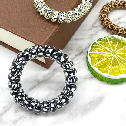9-pack hair ties - Braided hair ties - Curly hair ties - Hair ties that can be worn as bracelets - Very elastic - Lightweight - Leopard print hair ties for phone cords