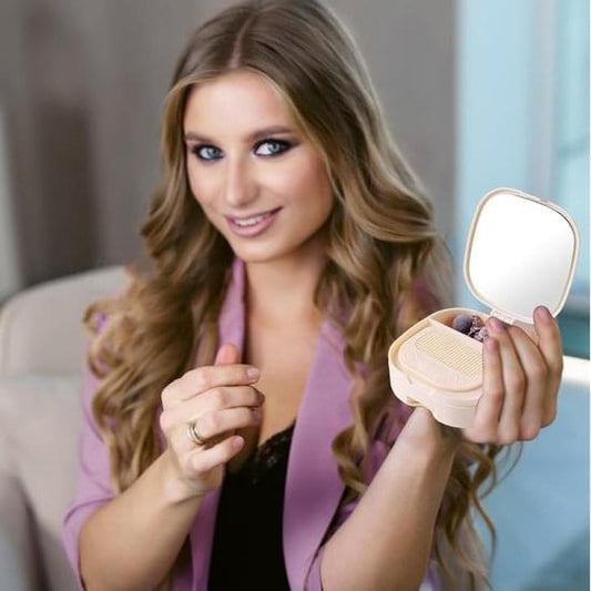 Portable vanity mirror with foldable frame and open light beige storage box