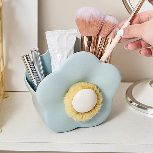 Blue flower makeup brush holder with white center opening