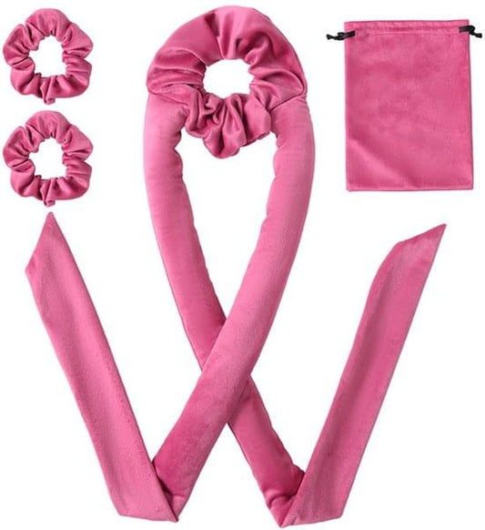 Pink fabric hair rollers with scrunchie loops and matching storage bag.