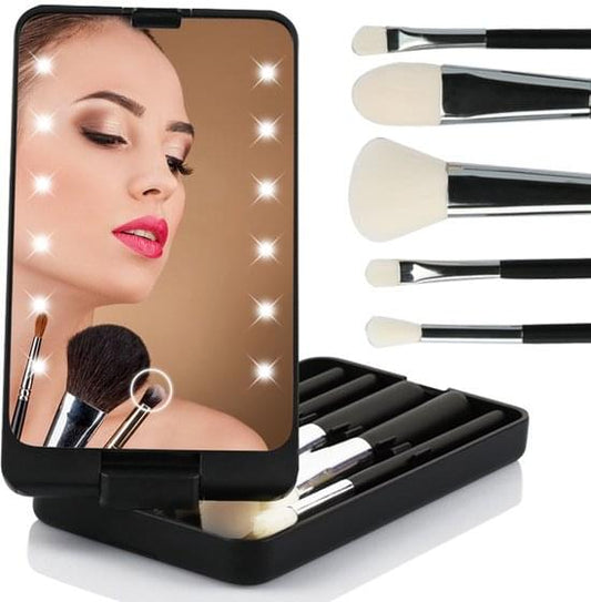 Lighted makeup mirror stand with black case and five makeup brushes on tray