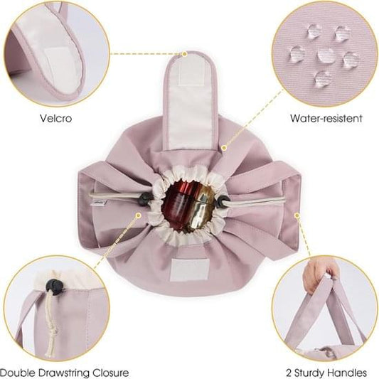 Pink foldable drawstring makeup bag with bow top and two pull handles