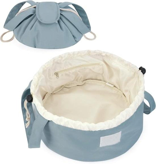Blue foldable drawstring makeup bag, open top with cream lining and drawcord ties