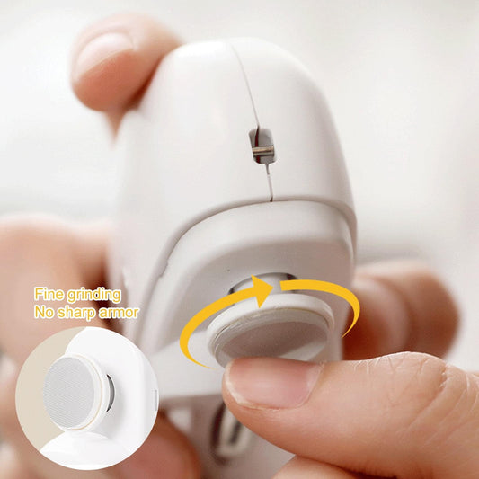 Electric nail trimmer with grinding head, held in hand near fingertips