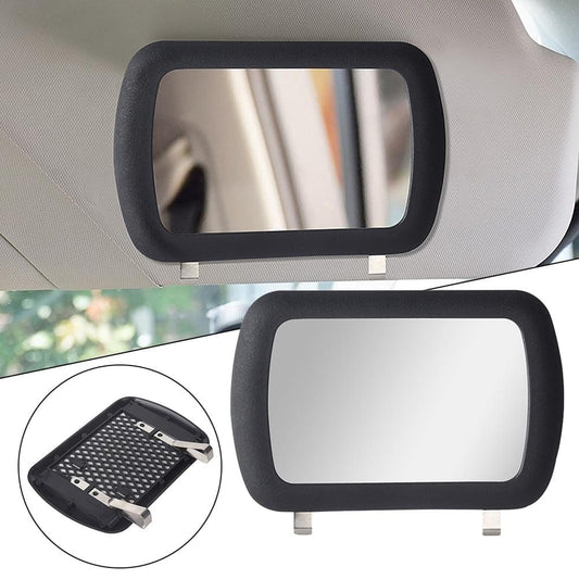 Car sun visor mirror with black rectangular frame and reflective glass