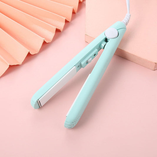 Mint blue mini hair straightener with ceramic plates and power cord