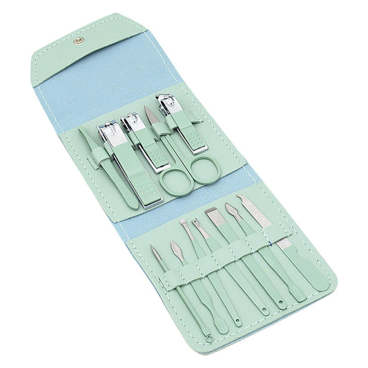 Nail grooming tool set in mint green folding case with multiple metal cutters and files