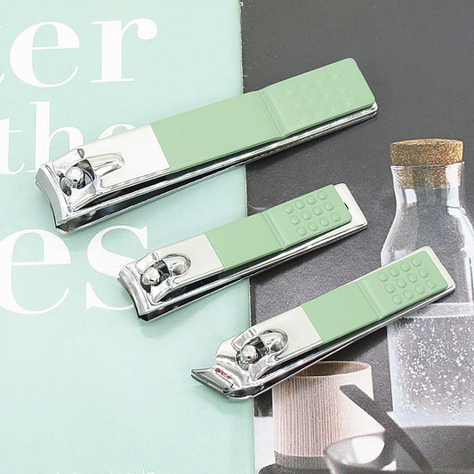 Nail clippers and grooming tools in mint green folding case, metal blades with handles