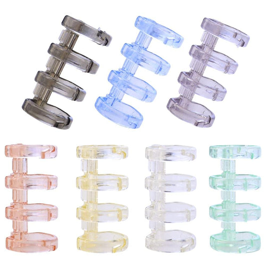 Assorted transparent loose-leaf binding rings in clear, blue, pink, yellow, green, and gray