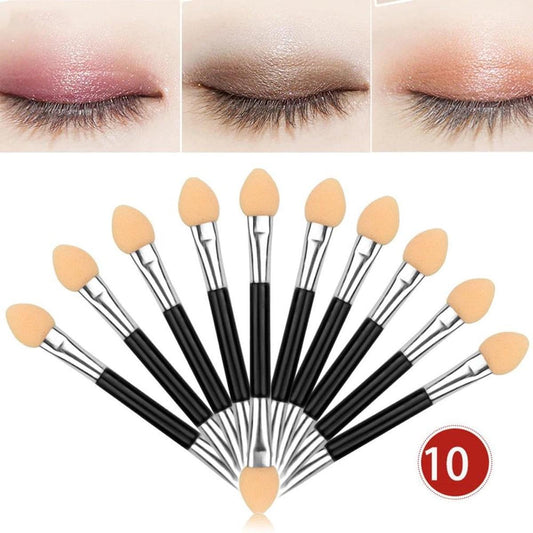 10-piece eyeshadow brush set with beige tips and black handles, fanned arrangement