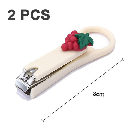 Two fruit charm nail clippers, pale cream and mint handles, 8cm length
