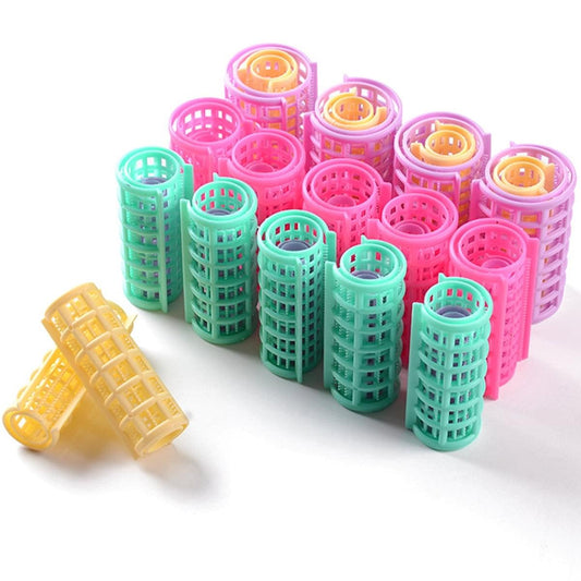 Snap hair rollers set with stacked pink and mint green rollers and one yellow roller
