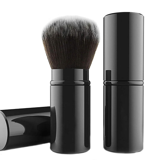 Retractable flat-top kabuki powder brush with black handle and protective sleeve