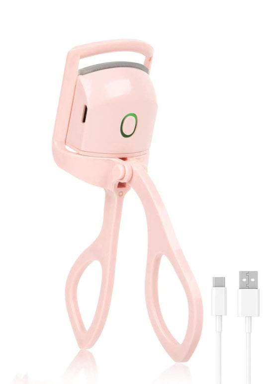 Pink heated eyelash curler with silicone clamp and curved handle, ready to use