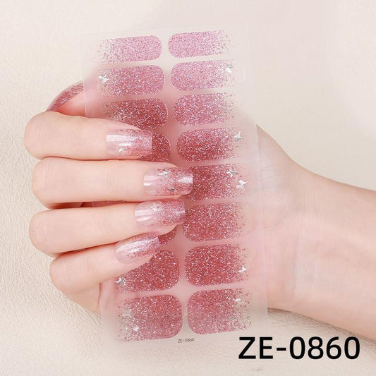Pink glitter nail sticker sheet with oval tips and small star accents