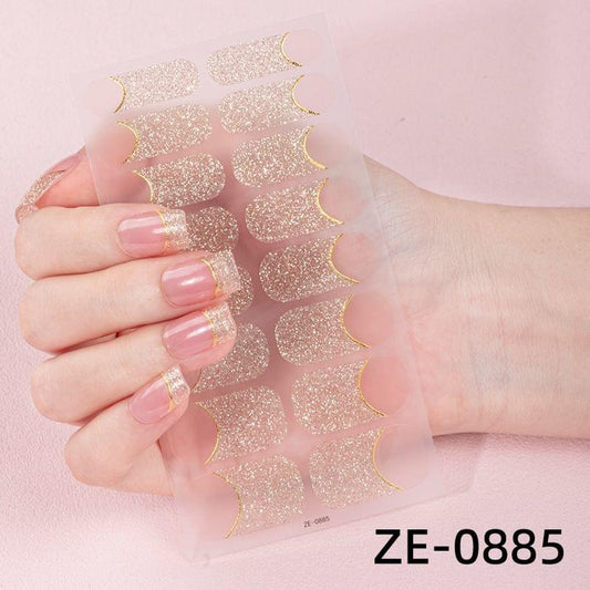 Gold glitter nail polish film stickers with curved half-moon nail shapes