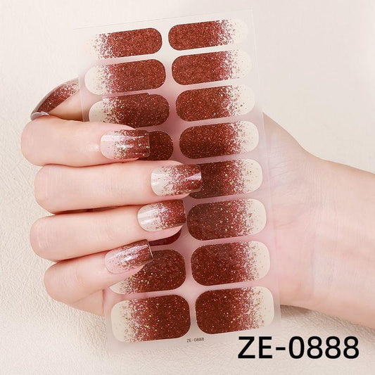 Glitter nail sticker set with dark brown and nude swipe patterns on press-on shapes