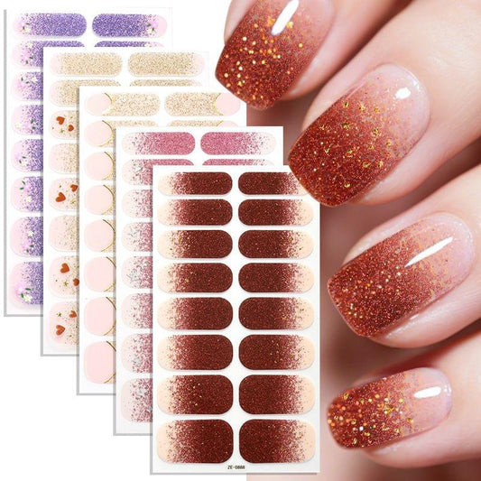 Nail stickers on sheet: glitter nail designs with gold flecks and dark red base