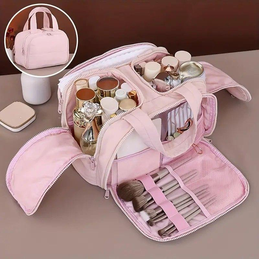 Pink large travel toiletry and makeup bag, open with compartments and elastic brush straps