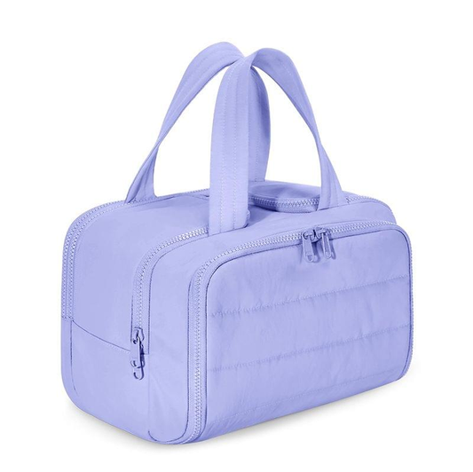 Travel toiletry bag with wide carry handles and front zipper pocket