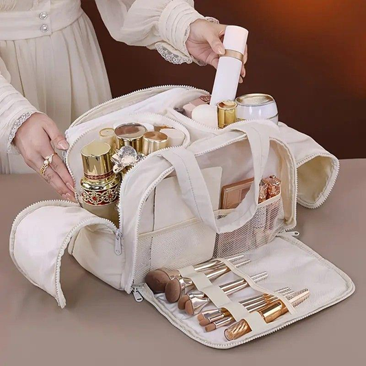White toiletry and makeup bag with compartments, open top and side pouches