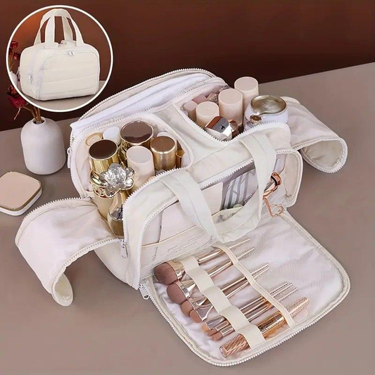 Light beige toiletry and makeup bag, open with zip compartments and elastic straps