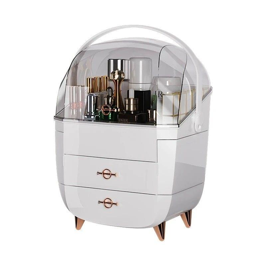 White flip-top cosmetic organizer with clear dome, stacked bottles inside and two drawers