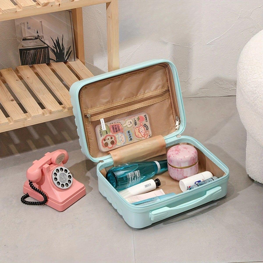 Light blue open mini makeup case with zipper compartments and vanity items inside
