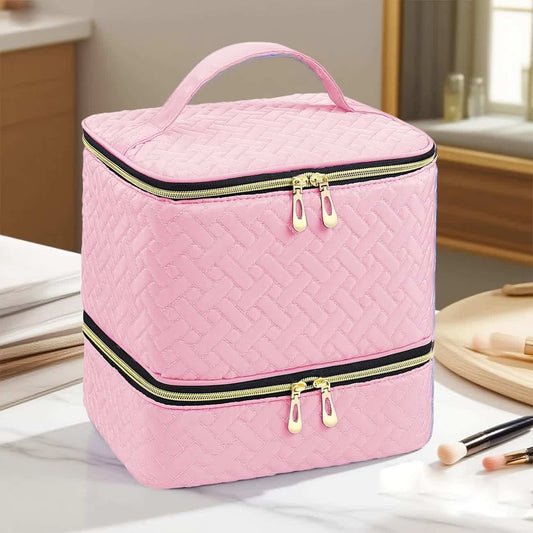 Pink double-layer nail organizer bag with quilted weave, top handle, and dual zip closures