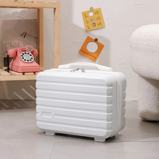 White mini makeup case with top handle and zip closure, ribbed sides