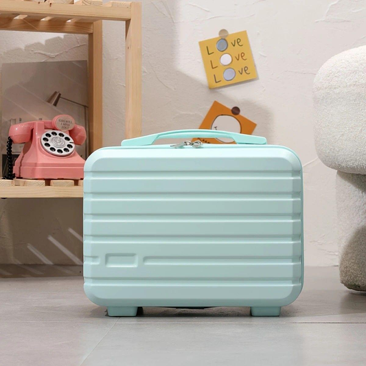 Light blue mini makeup case with zipper closure and front handle, hard-shell style