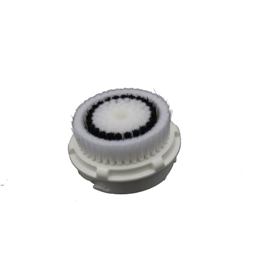 Round facial brush head with black-and-white bristle pad and pale gray base
