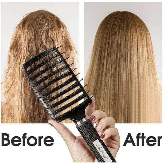 Black detangling hairbrush held near long hair with vented prongs