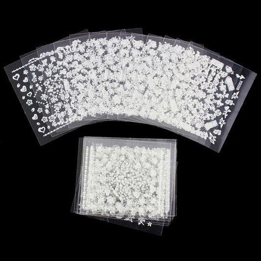 White floral nail art sticker set on clear sheets, plus one smaller sheet of decals