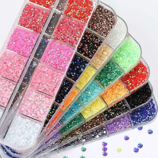 Multi-color rhinestone nail decorations in clear divided storage tray