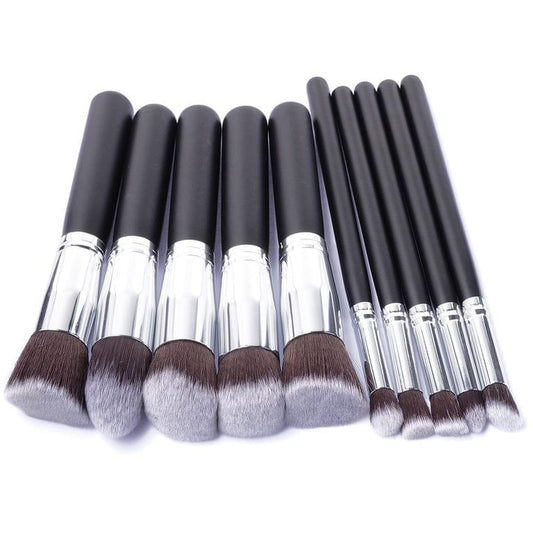 Makeup brush set with black handles, silver ferrules, and soft gray and brown bristles