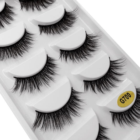 Black faux mink false eyelashes in tray, stacked lash bands with G700 label
