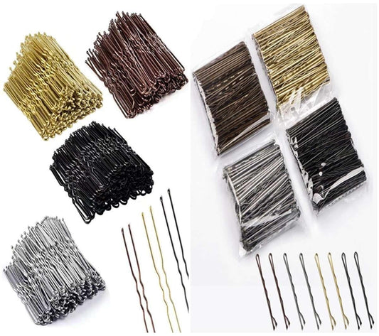 Assorted metal hairpins and U-shaped clips, with loose pins for styling