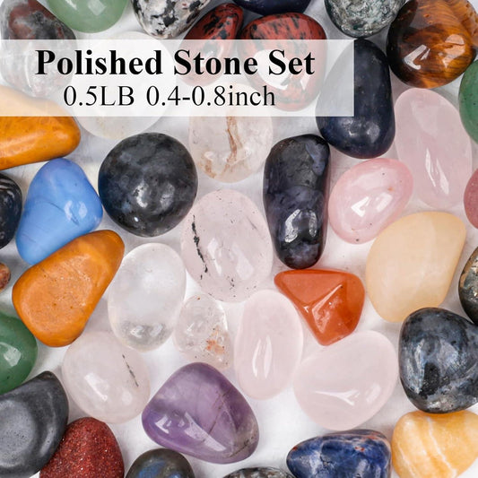 Mixed polished tumbled stones in orange, blue, pink, white, and dark gray