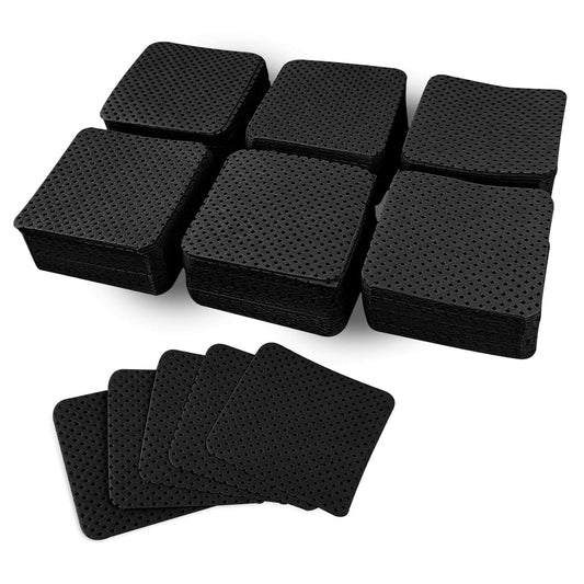 Black lint-free nail wipes, stacked square sheets with perforated texture