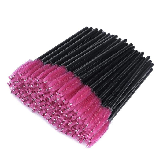 Disposable eyelash brush set with pink spoolie heads and black handles