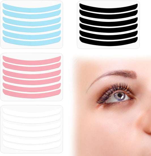 Set of lash lift ribbon pads in blue, pink, black, and white