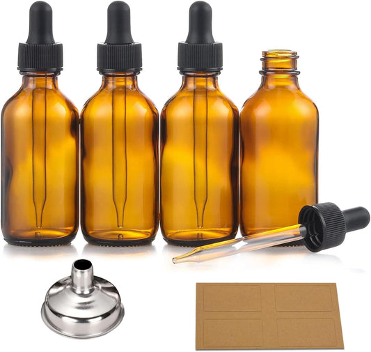 Dark amber glass dropper bottle set with black caps, multiple bottles