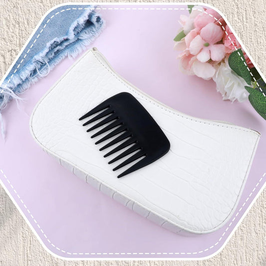 White hair comb wallet with a black wide-tooth comb insert